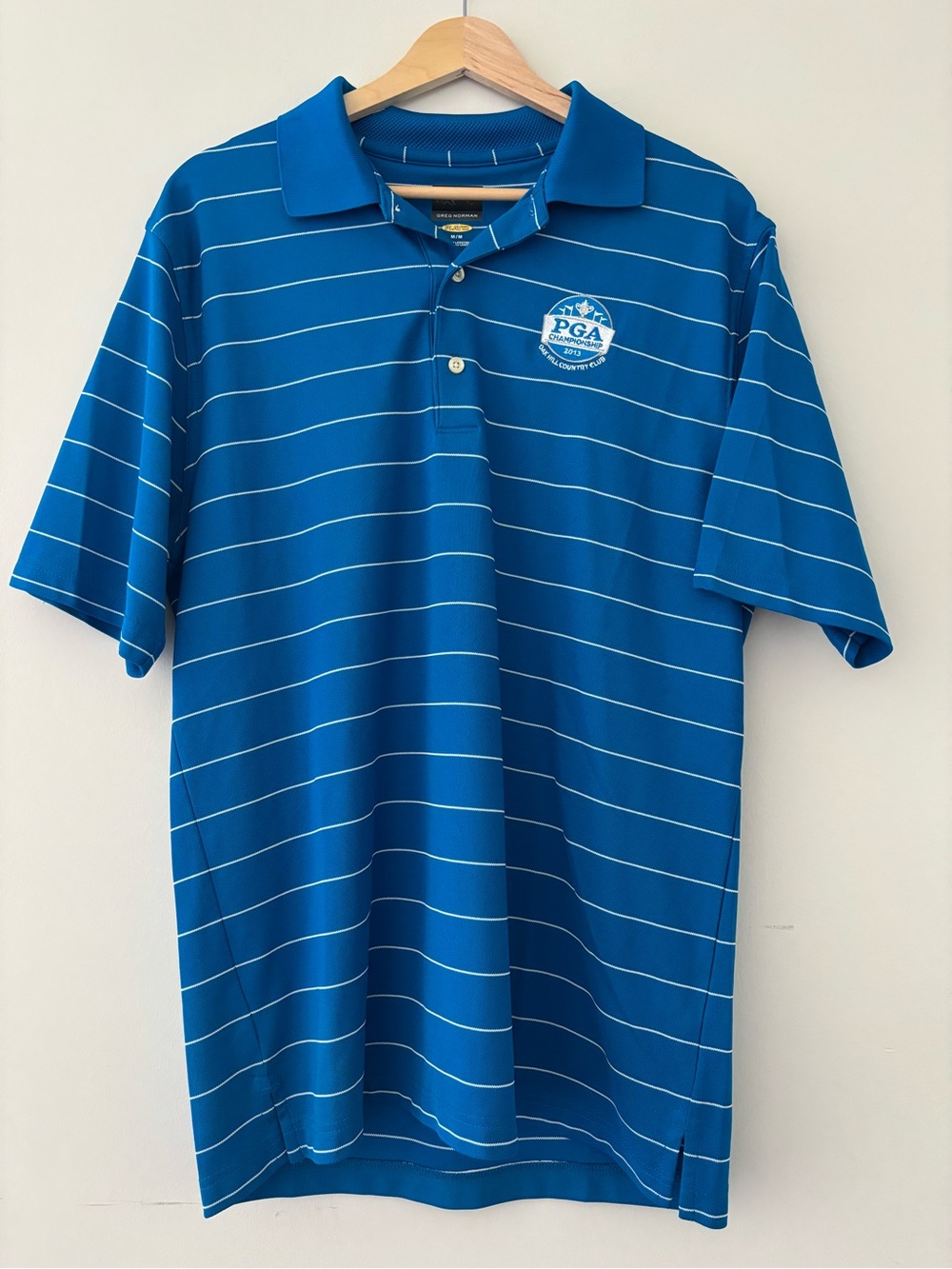 Greg Norman Collection Blue Polo with White Stripes and PGA Logo